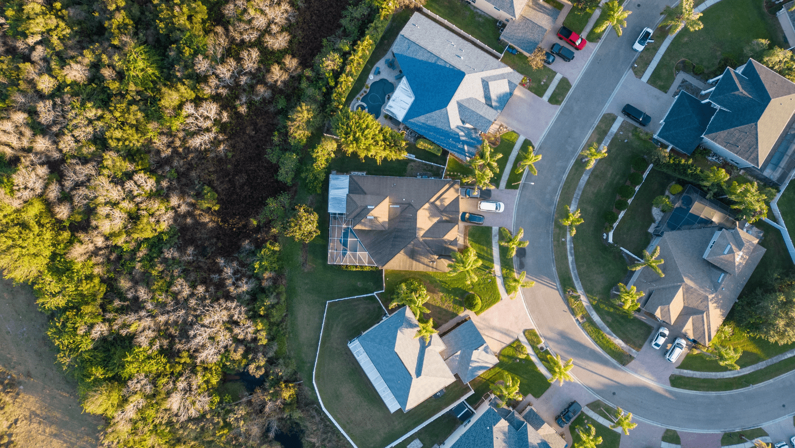 Aerial view of a suburban neighborhood under HOA governance