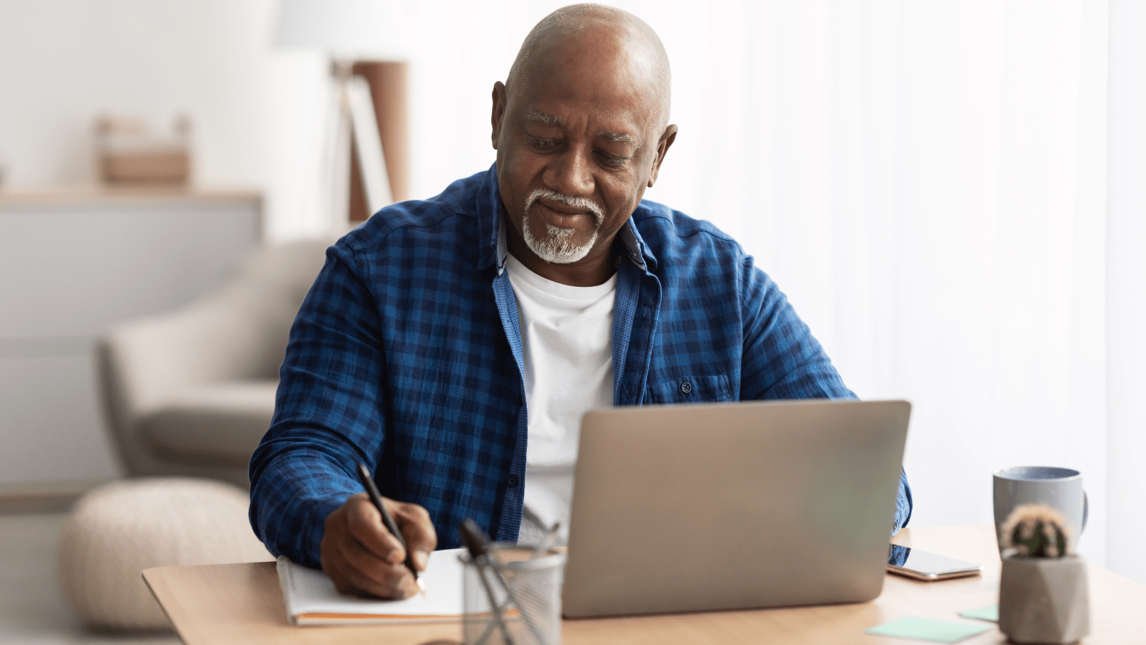 Homeowner researching can you get solar if you reside in an HOA on laptop at home